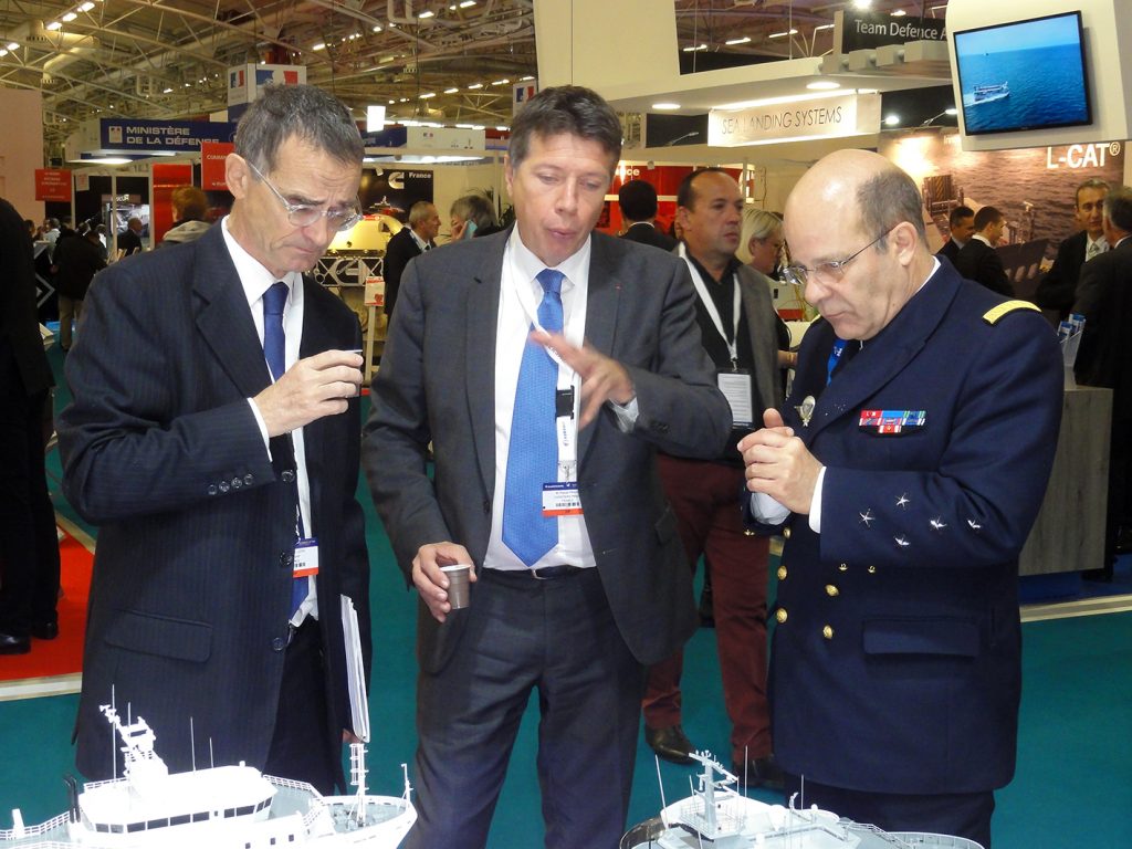 Admiral Christophe Prazuck, the French Navy chief of staff (at right) in discussion with Pascal Piriou (centre), head of the Piriou shipyard in Concarneau, Brittany.  © J.-M. Guhl