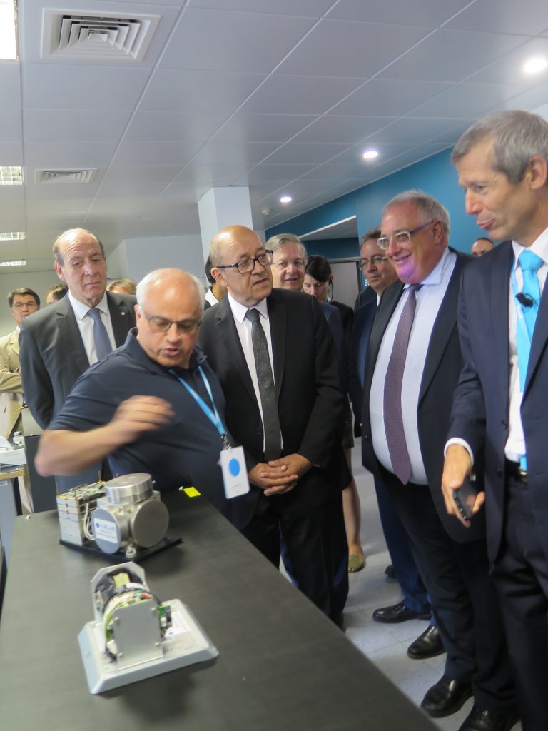 Jean-Yves Le Drian is being shown different types of inertial platforms produced by iXblue. Next to him, Hervé Guillou, CEO of DCNS  one of iXblue’s best customer  and Philippe Debaillon-Vesque, iXblue President and CEO. © J. Roukoz