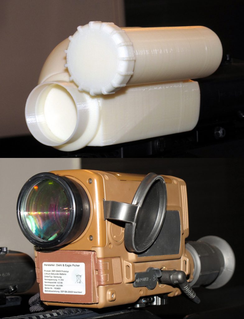 Bottom, the current aspect of AIM Infrarot-Module short wave infrared sight, on top the final case that will host the system, and which will be available in 2017. © P. Valpolini